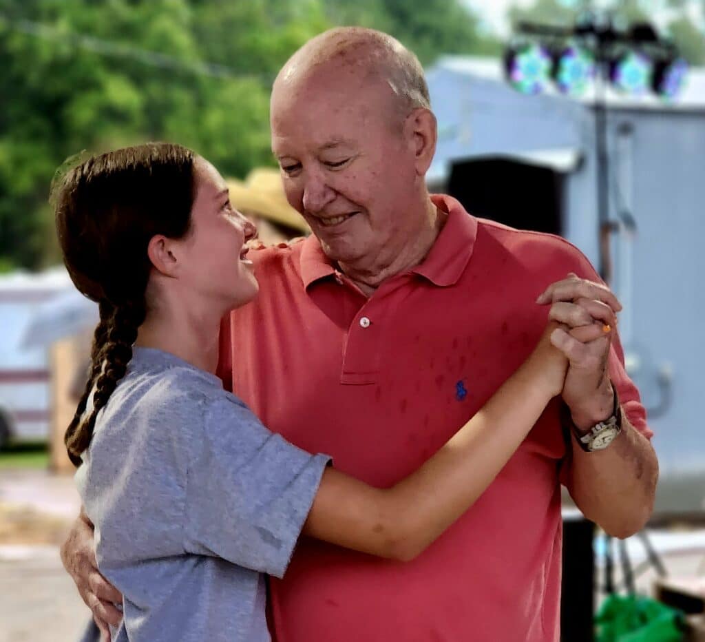 Bob Ford and his granddaughter, Lily, enjoy a dance. Photo by David Day