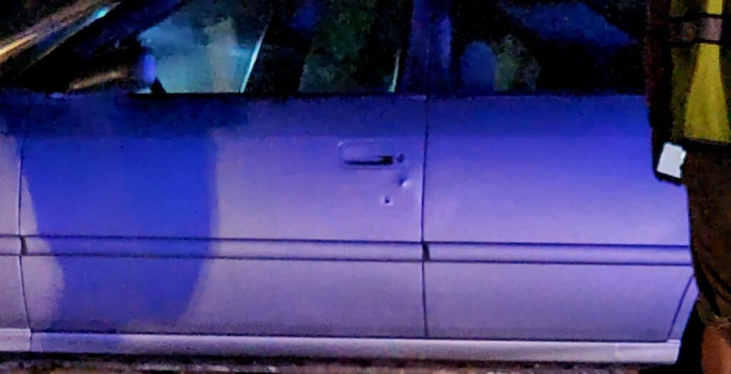 A gunshot below the handle on one of the vehicles hit on 2nd North at Clay. Photo by David Day