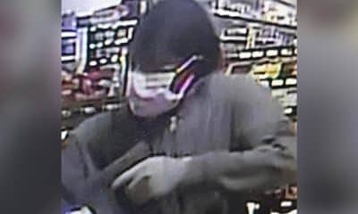 Man robbing store