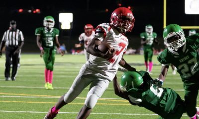 WC football player running ball