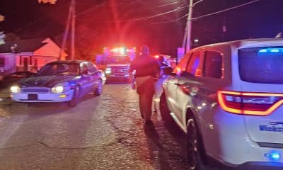 One trapped under vehicle