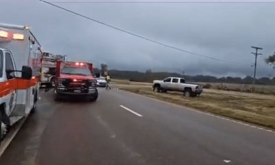 First responders work a one-vehicle accident with entrapment on 61.