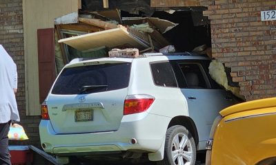 car crash into house