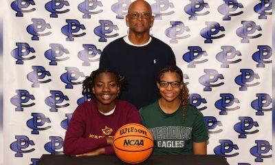 Coach Casey Fisher and Jae’la Smith and Lauren Madison