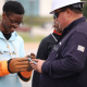 Photos are Walter Beesley, Entergy Mississippi lineman, shows student gloves. Grand Gulf training instructor Quinten Pullen shows students the control room simulator. Source: Entergy Nuclear Grand Gulf