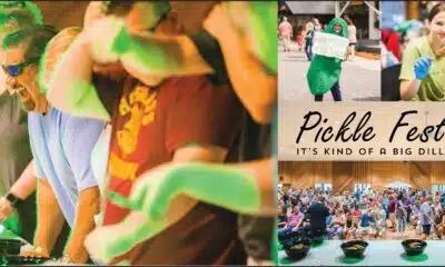 Crowd enjoying activities at the Mississippi Pickle Fest, featuring pickle-themed foods and drinks.