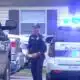 Flowood police officers at the scene of an officer-involved shooting, with police vehi — officer-involved shooting Flowood