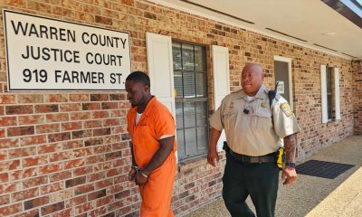 Grayer escorted into the courtroom Photo David Day