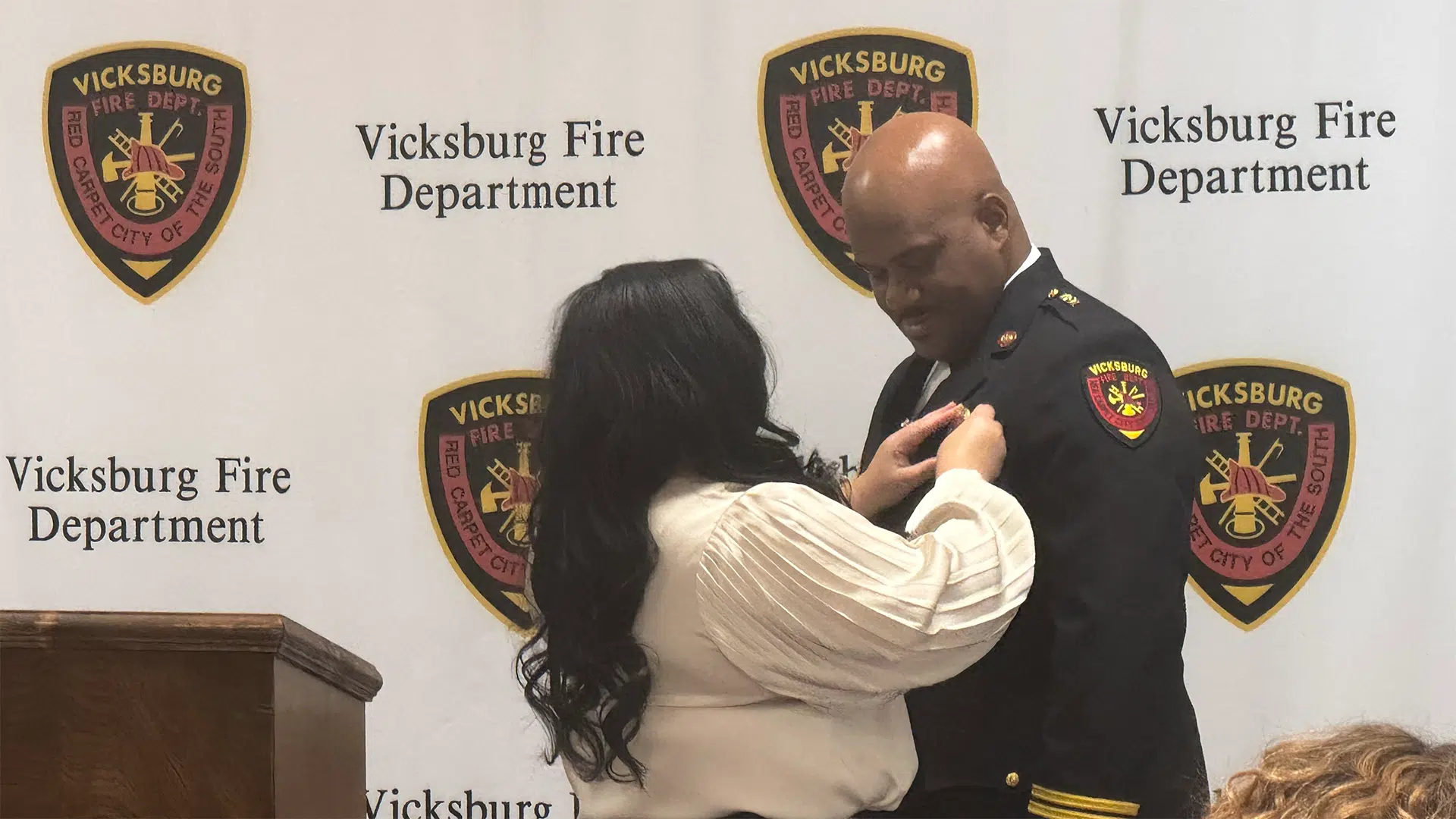 Assistant Chief Daryl Carson, pinned by his wife Kimmerli Carson Photo by Don Hill