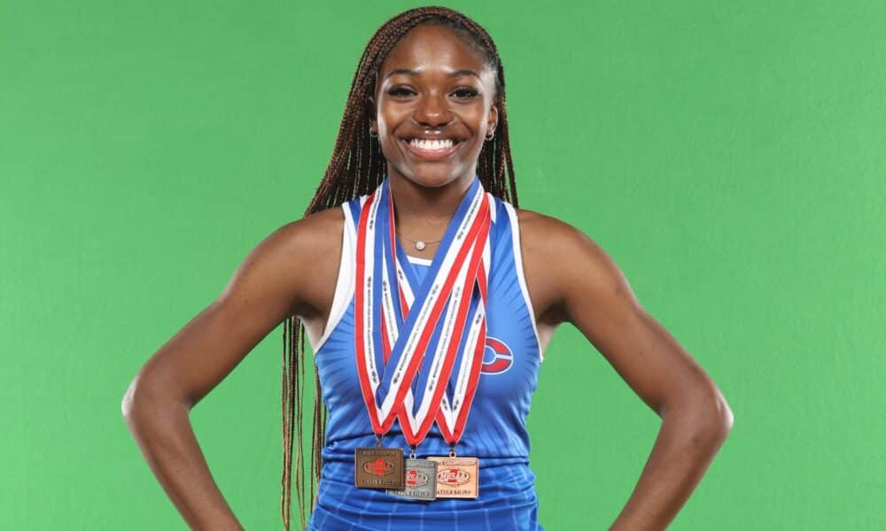 Vantrel Reed Burrell sprints her best time in the 400 - Vicksburg Daily News