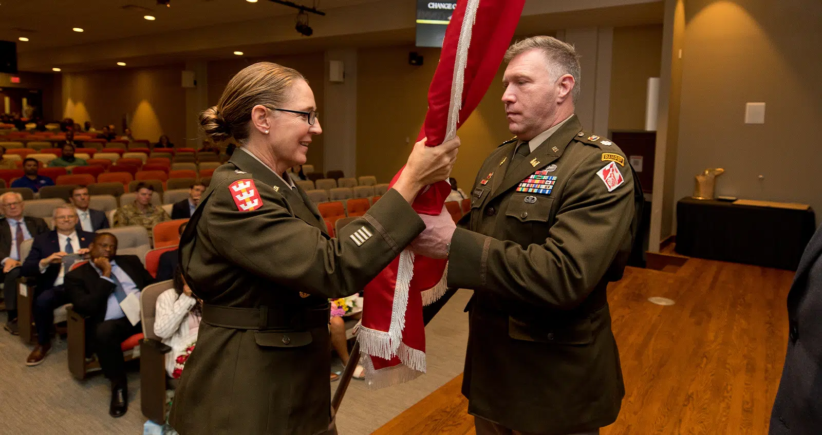The passing of the colors from the Deputy Commanding General MG Kimberly Colloton to the new commander (Jared Eastman, Visual Information Specialist:ERDC PAO)