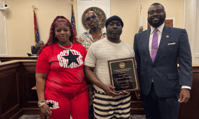 Headquarters barbershop Amaze award recipient with TJ Mayfield Photo Don Hill