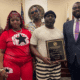 Headquarters barbershop Amaze award recipient with TJ Mayfield Photo Don Hill