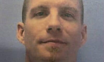 fugitive in custody John Gray