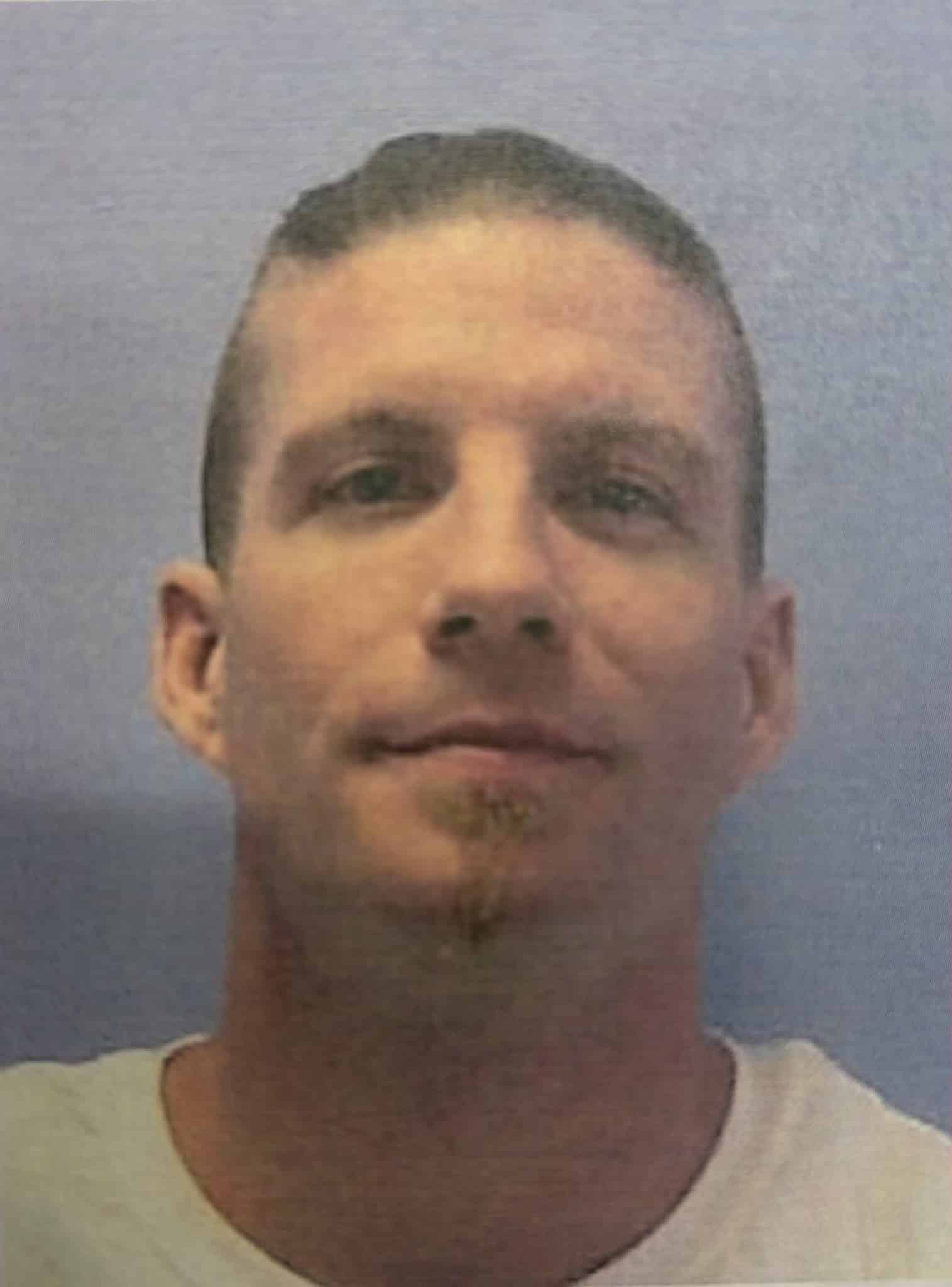 fugitive in custody John Gray