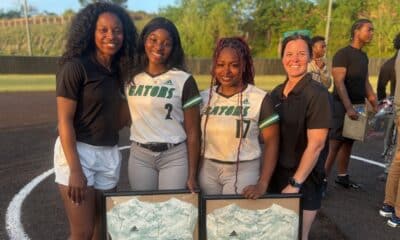 L-R Head Coach Briana Knox, Shandrea Lockridge, Taylor Howard, and Assistant Coach Samantha Bailey
