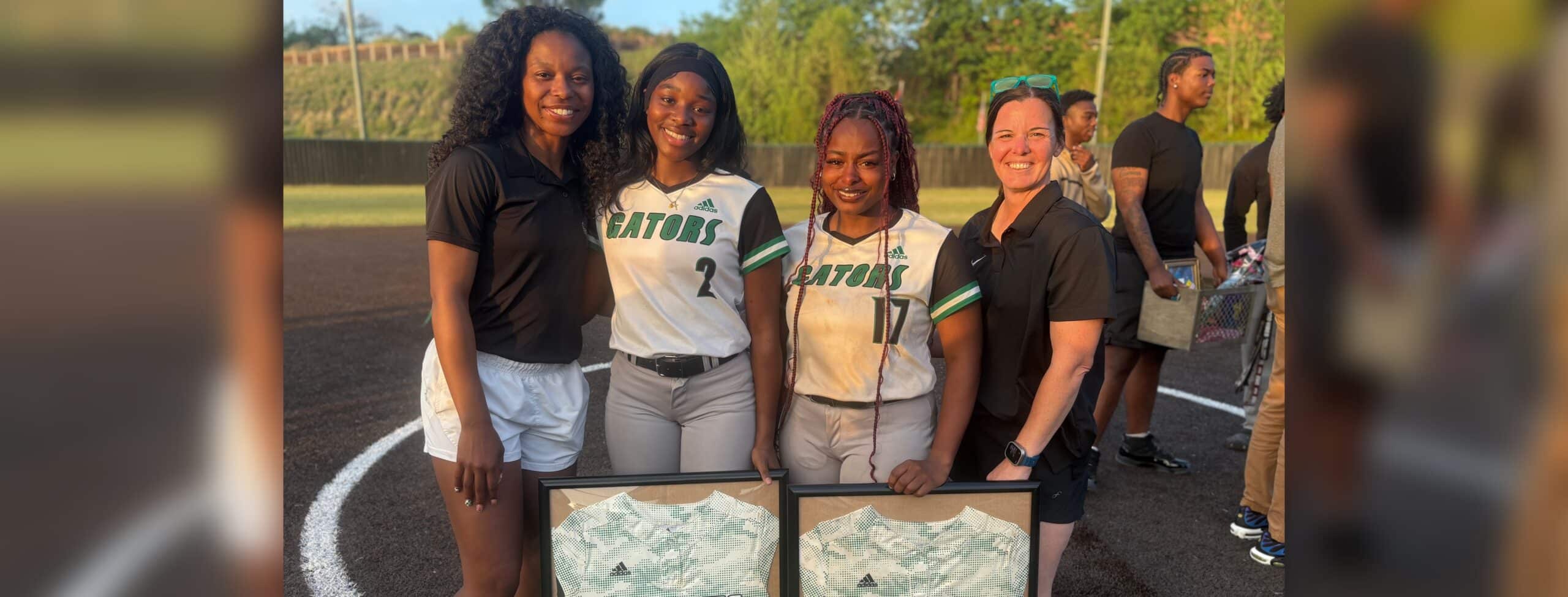 L-R Head Coach Briana Knox, Shandrea Lockridge, Taylor Howard, and Assistant Coach Samantha Bailey