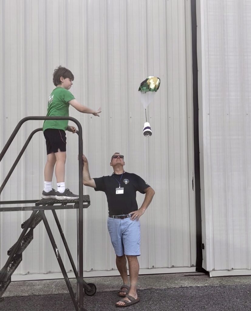 Campers test their spacecraft.