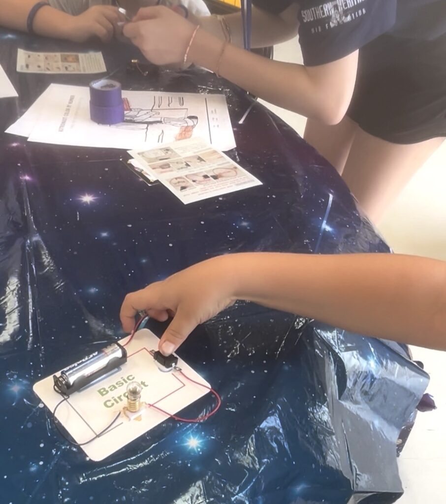 Campers experiment learning basic circuitry.