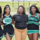 L-R Raylyn Parson (co-captain), Rihanna Ringo (co-captain), Coach Aeriel Stokes, Cedrionna Blackmore (captain), & Xaria Williams (co-captain). Photo by Richard Miller