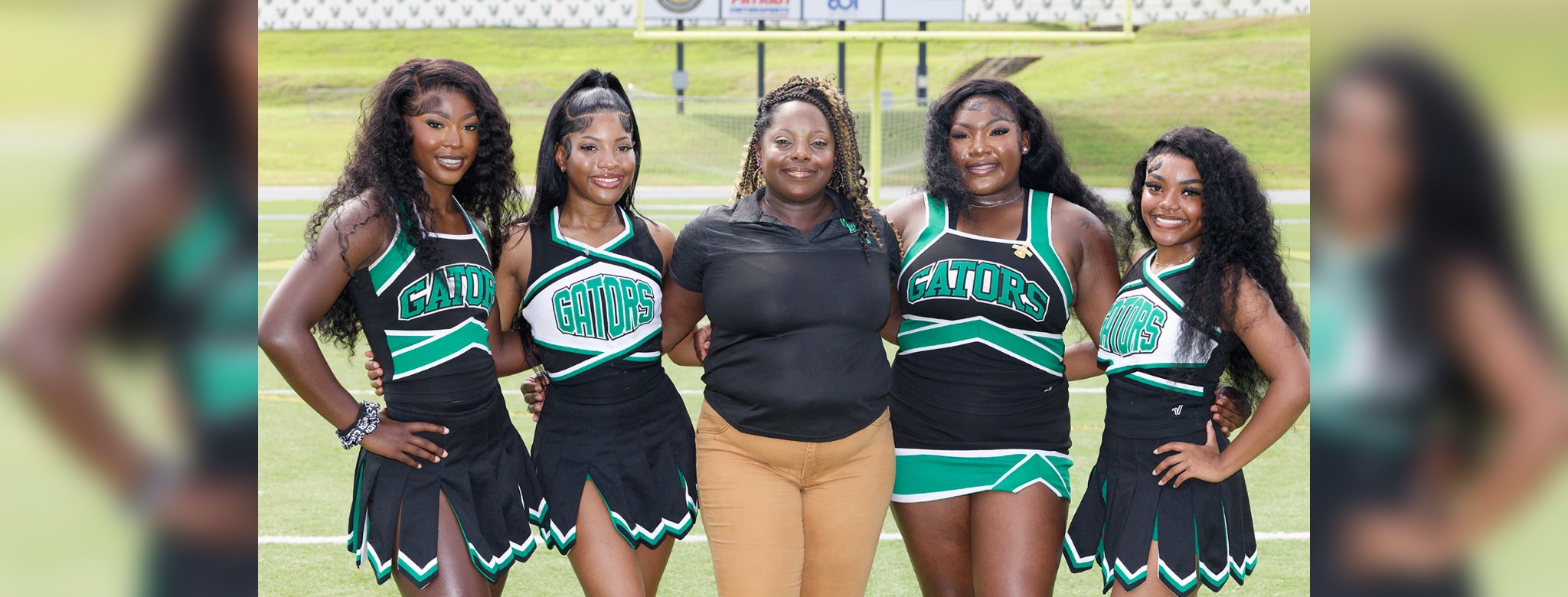 L-R Raylyn Parson (co-captain), Rihanna Ringo (co-captain), Coach Aeriel Stokes, Cedrionna Blackmore (captain), & Xaria Williams (co-captain). Photo by Richard Miller