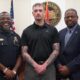 L-R Deputy Chief Tommy Curtis, Michael Gadd and Mayor Willis Thompson