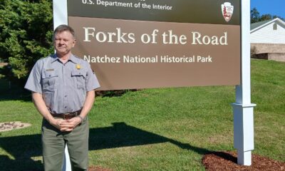 Jeff Mansell with Forks sign
