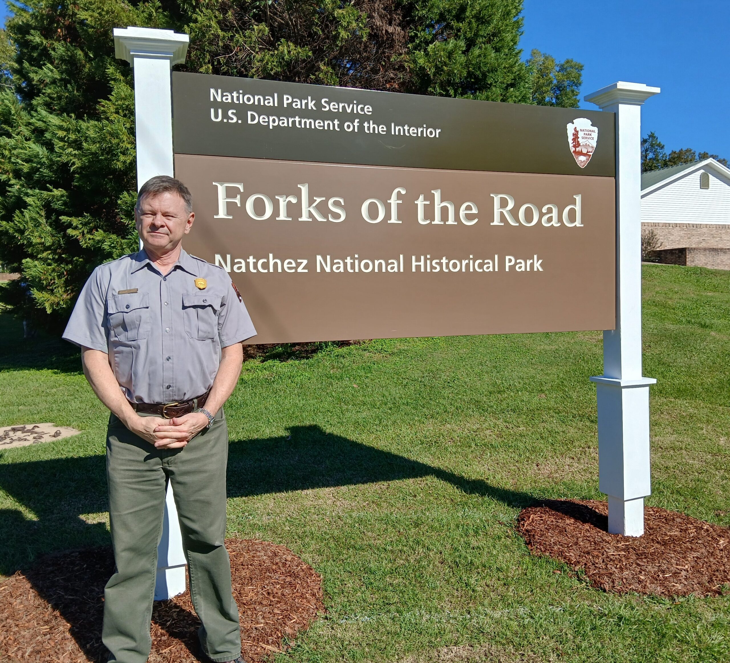 Jeff Mansell with Forks sign