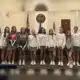 Alderman Mayfield with local students receiving AMAZE Awards, standing in a f — Alderman Mayfield gives three AMAZE Awards