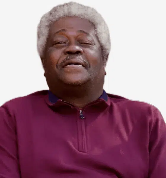 Smiling older man with gray hair wearing a maroon sweater, exuding warmth and contentment. — Roosevelt “Sonny” Jones Jr