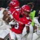 Warren Central player evades defenders during a rainy football g — Warren Central rolls past Pearl 40-14 to improve to 2-0