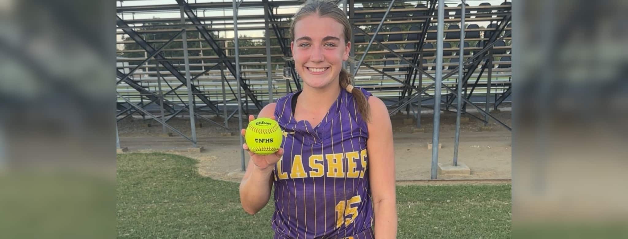 A young female softball player in a purple jersey — Theriot’s three-run homer lifts St. Aloysius past Washington School