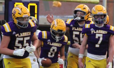 St. Aloysius Junior High football players celebrating a touchdown during a game against St. Andrews.