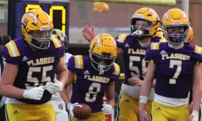 St. Aloysius Junior High football players celebrating a touchdown during a game against St. Andrews.