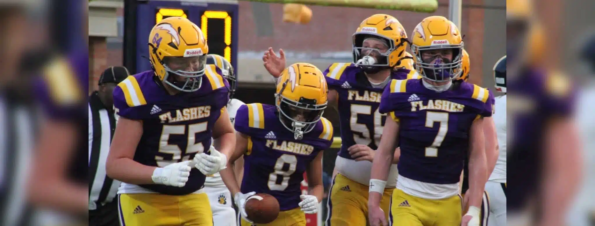 St. Aloysius Junior High football players celebrating a touchdown during a game against St. Andrews.