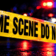 Police crime scene tape reading 'CRIME SCENE DO NOT CROSS' with blurr — Vicksburg man charged with capital murder in Texas