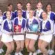 The Flashettes team poses with their trophies after winning the 12th consecutive state title at the MAIS — Flashettes 12th