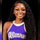 Smiling cheerleader in Alcorn State uniform, showcasing pride and confidence. — Amyiah Montgomery