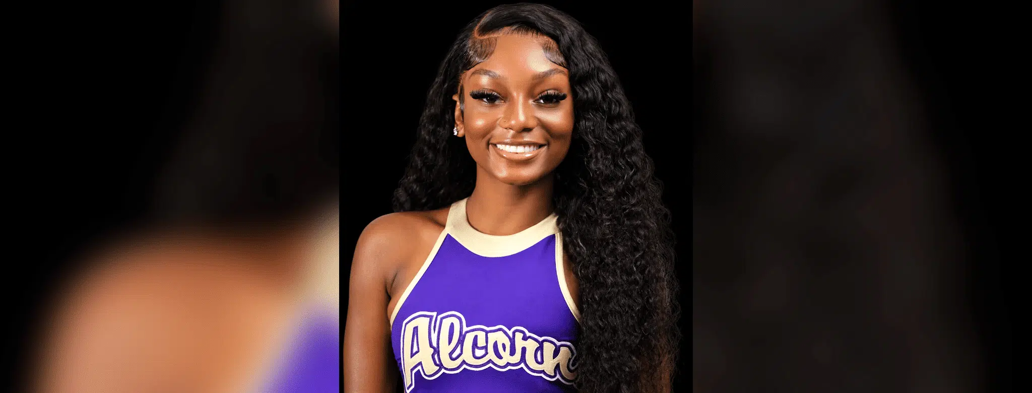 Smiling cheerleader in Alcorn State uniform, showcasing pride and confidence. — Amyiah Montgomery