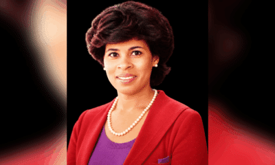 Portrait of Vicki Roach Barnes, a distinguished judge, wearing a red blazer and pearls.