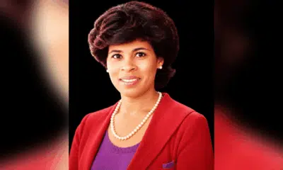 Portrait of Vicki Roach Barnes, a distinguished judge, wearing a red blazer and pearls.