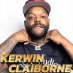 Kerwin Claiborne posing confidently while wearing a chain and a baseball cap, promoting his comedy show.