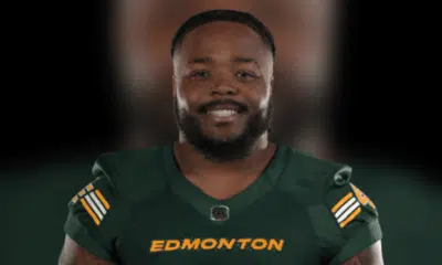 Nick Anderson smiling in Edmonton Elks uniform, showcasing his leadership in football.