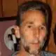 A man with a beard and short hair, looking directly at the camera, with a blurred backgr — Ronald “Ronnie” Lynn McLeod
