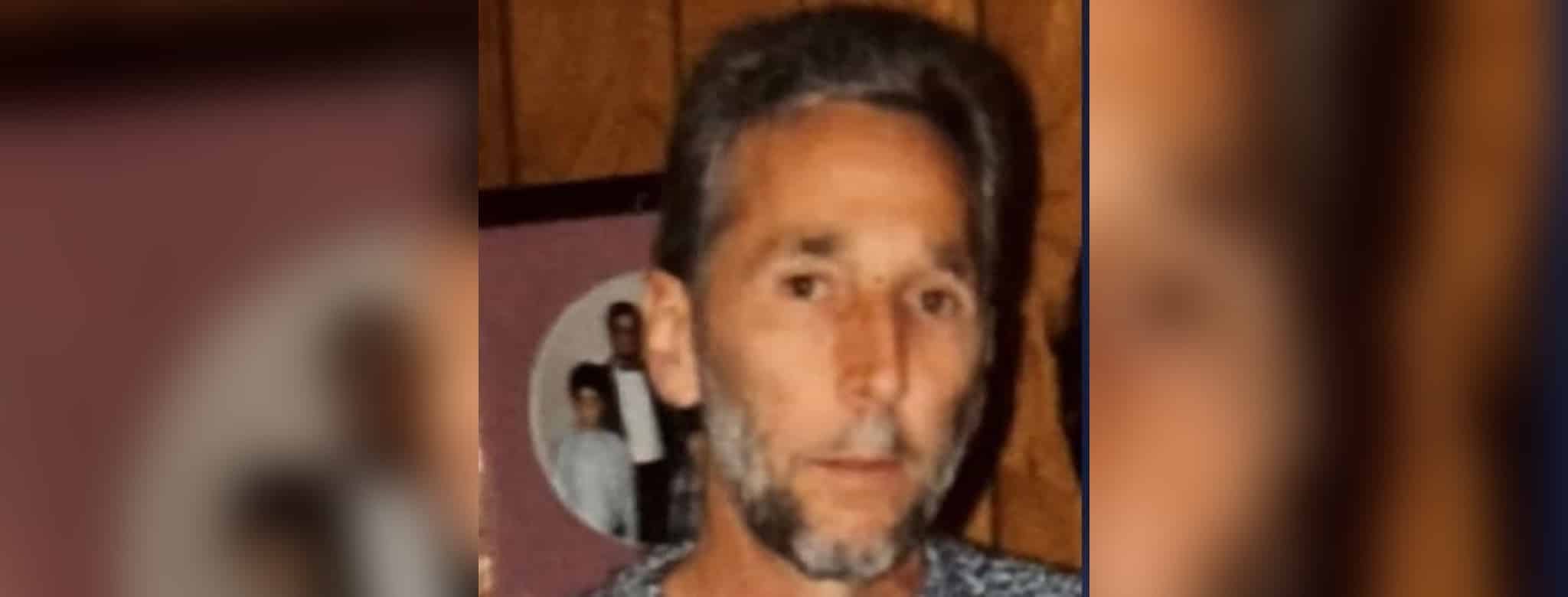 A man with a beard and short hair, looking directly at the camera, with a blurred backgr — Ronald “Ronnie” Lynn McLeod