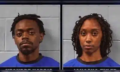 Two individuals in blue police uniforms, one male and one female, with a police backdrop related to the Halls Ferry shooting.