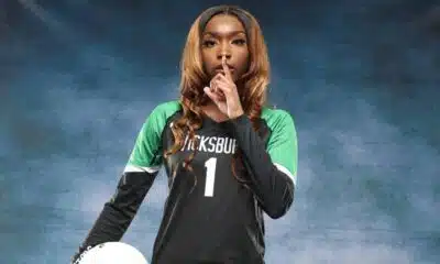 A Vicksburg volleyball player in a black jersey holds a vo — Vicksburg volleyball sweeps Holmes County Central on the road