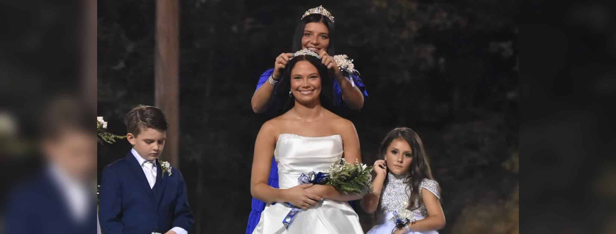 Mia Abdo crowned as PCA's 2026 Homecoming Queen during a football game ceremony.