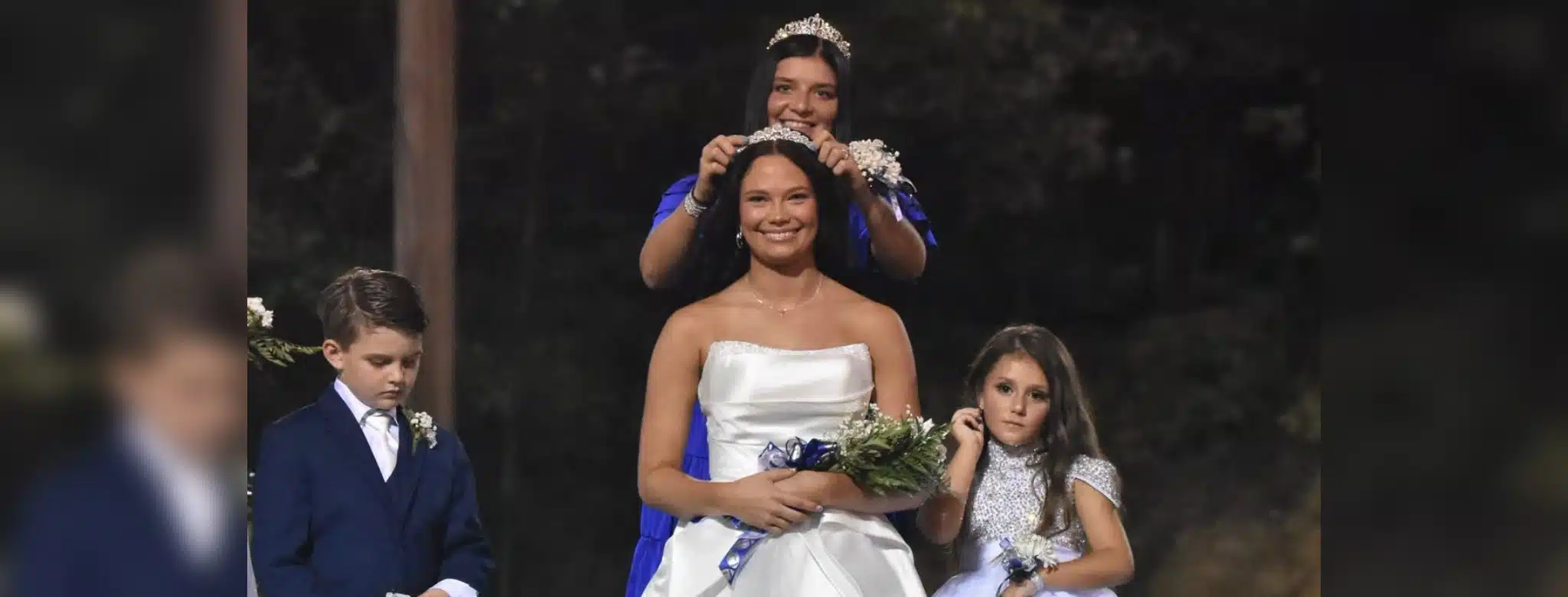 Mia Abdo crowned as PCA's 2026 Homecoming Queen during a football game ceremony.