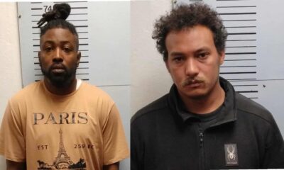Two men, Kendrick Britton and Justin Cantrell, facing charges related to child sex crimes, standing against a height chart.